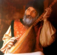 Osho_with_instrument